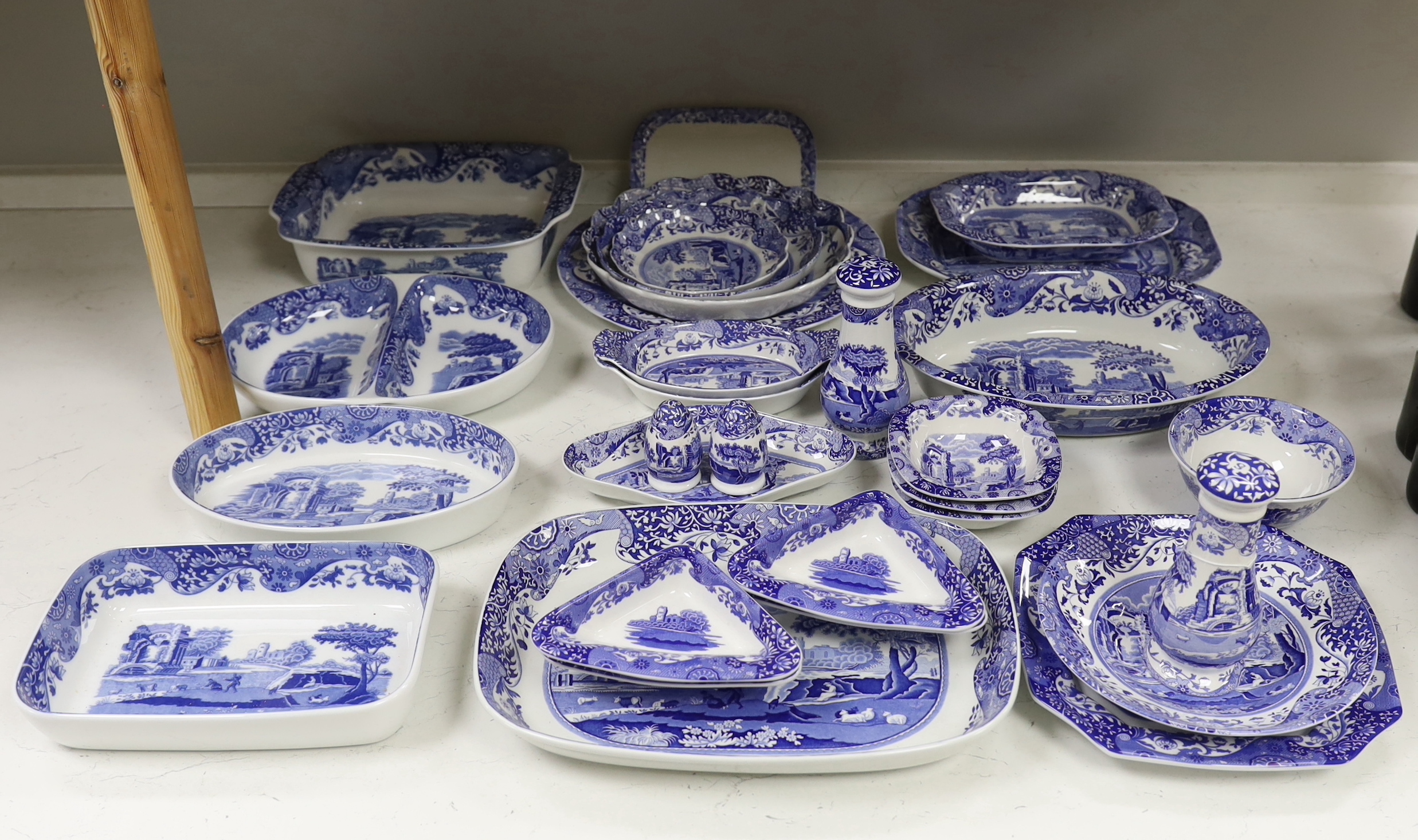 A collection of Spode Italian blue and white various sized serving dishes, cruets etc